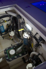 NevisLT LED utility light, 1,000+ lumens, 180-degree spread, ignition-protected, dimmer compatible installed in boat bildge.