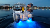 SeaBlaze X2 Spectrum underwater light, 6,000+ lumens, polished installed on center console moving at night.