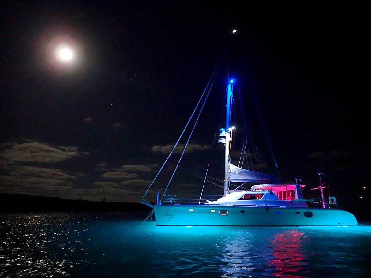 SeaBlaze X2 Spectrum underwater light, 6,000+ lumens, polished installed on catamaran.