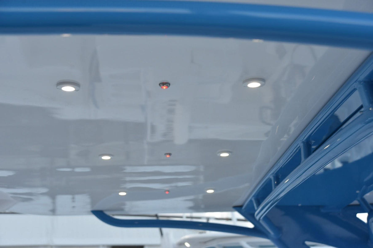 Orbit Flush Mount LED Down Light in white, red, blue, and purple color options installed on centerconsole hardtop 