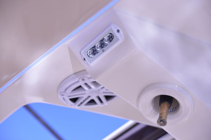 CapriLT LED Flood Light in white finish, featuring a compact, durable design in white installed on centerconsole