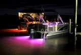 Zambezi Quattro underwater light in purple on pontoonboatinfront of house

