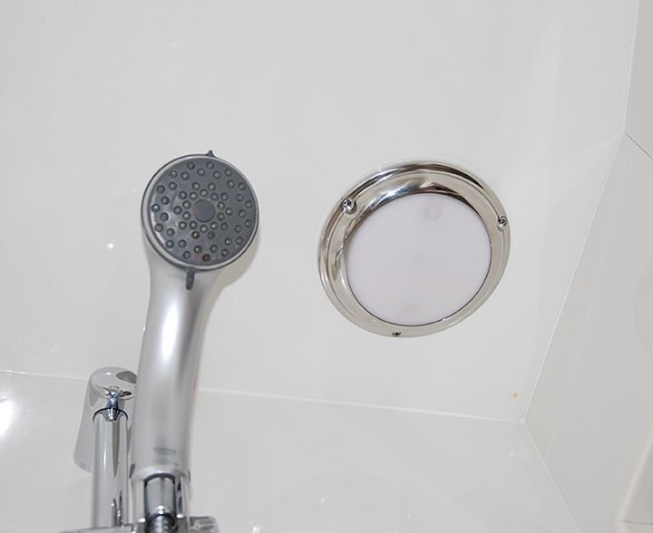 Touch Dome LED Light in white/blue output, featuring Optical Field Sense technology in shower